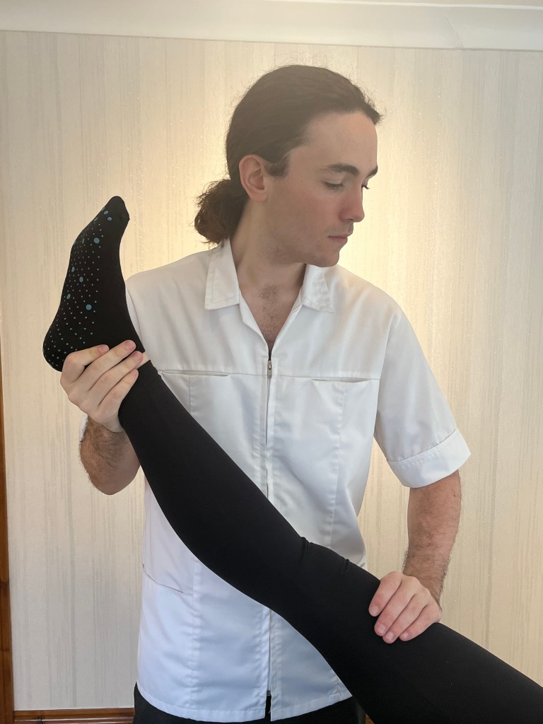 osteopath treating a patients pain in Barry